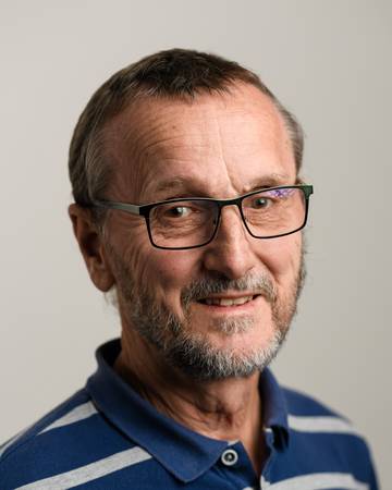 Dr Hugh Butler, author of Optimistic Storm